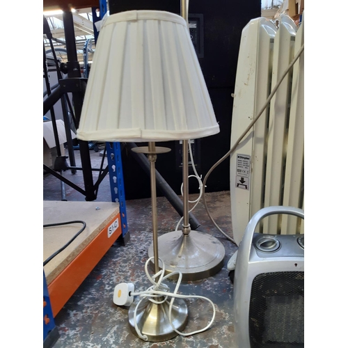 1066 - A matching pair of lamps with shades, one floor standing and one table