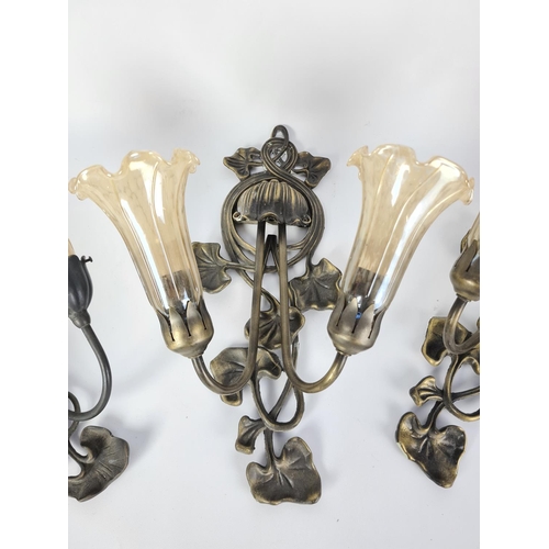 107 - Three Art Nouveau style brass wall sconces