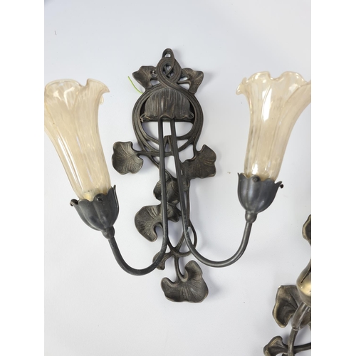 107 - Three Art Nouveau style brass wall sconces