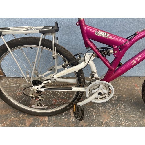 1096 - A purple and white Excel St. Moritz dual suspension ladies hybrid bike with rear carrier and 16 spee... 