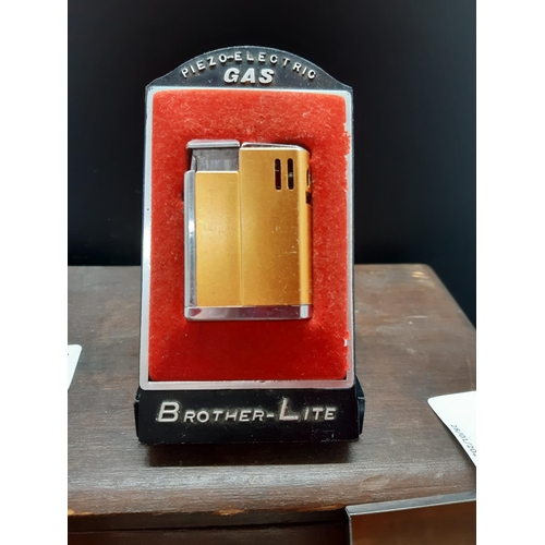 11 - Six items to include four various vintage cigarette cases, cased Brother-Lite gas lighter and a case... 