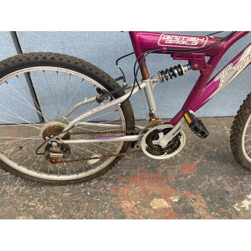 1107 - A purple and grey British Eagle Bolero dual suspension mountain bike with with 18 speed gear system