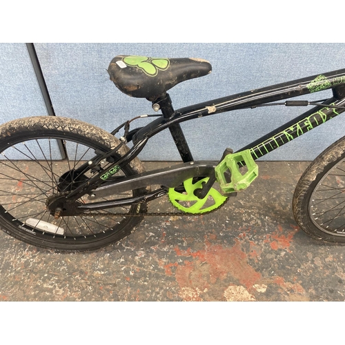 1109 - A black and green Muddy Fox Mutant BMX