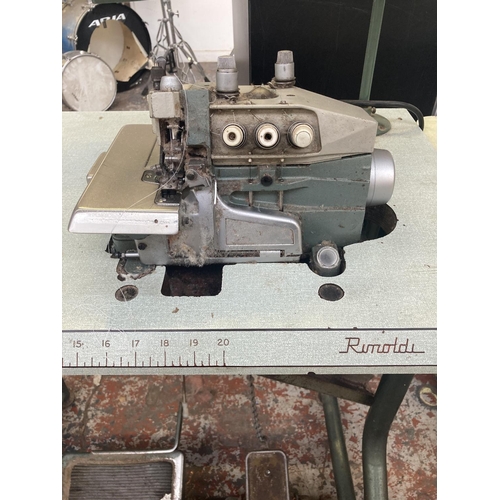 1119 - A vintage Rimoldi overlocker sewing machine with Singer 2850 rpm motor