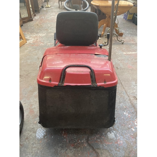 1122 - A red Countryside TCJ ride on tractor lawnmower with 12.5hp Briggs & Stratton engine, electric start... 