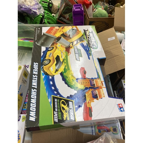 1133 - A large quantity of shop return toys and games to include Wave Racers Super Shunt Showdown, Teletubb... 