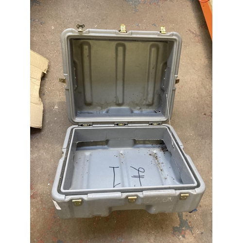 1140 - A grey plastic heavy duty flight case