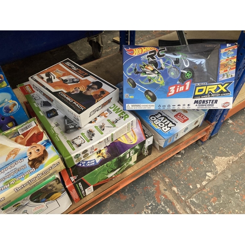 1155 - A large selection of shop return toys to include Hot Wheels 3 in 1 Drone-Rotor-Cross, Jurassic World... 