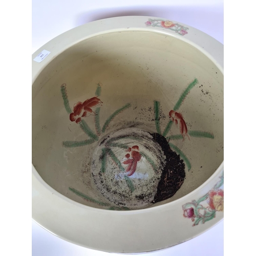 116 - A large Chinese porcelain planter - approx. 46cm high x 52cm diameter