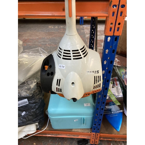 1161 - An orange and grey Stihl FS40 petrol strimmer