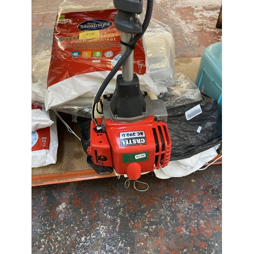 1162 - A red Castel BC390D petrol strimmer