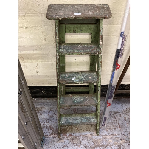 1172 - Two items, one vintage set of five tread step ladders and one bagged as new Vinex javelin