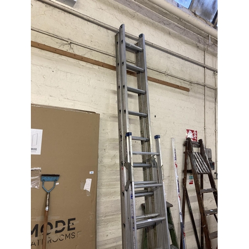 1173 - Two items, one aluminium multipurpose work ladder and one Abru 22 rung double extendable aluminium w... 