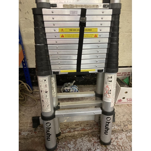 1177 - Two items, one grey Huhu telescopic ladder and one unbranded multipurpose telescopic ladder