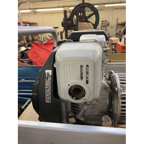 1193 - A grey Honda mains or 110v petrol generator