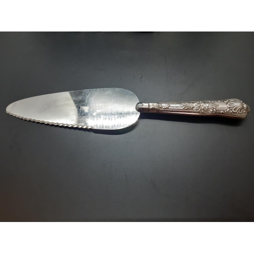 12 - A collection of stamped silver and plated ware to include Sheffield handled cake knife, tri-footed m... 