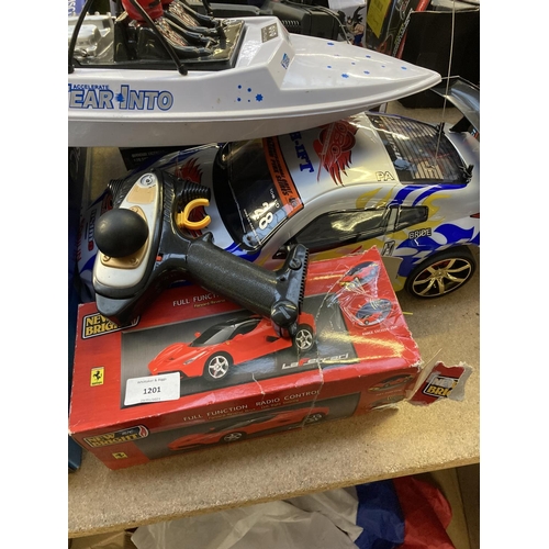 1201 - A selection of shop return toys to include Discovery digital metal detector, New Bright RC Bugatti V... 