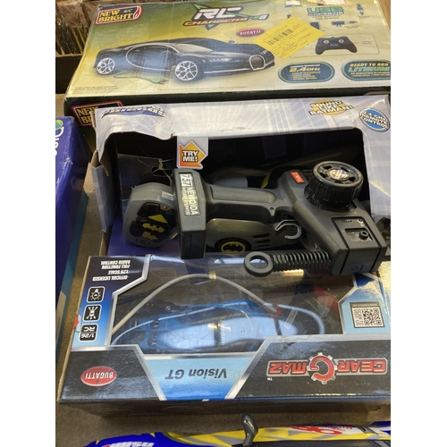 1201 - A selection of shop return toys to include Discovery digital metal detector, New Bright RC Bugatti V... 