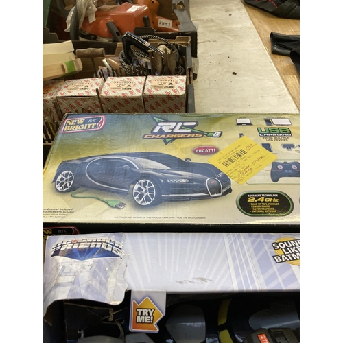 1201 - A selection of shop return toys to include Discovery digital metal detector, New Bright RC Bugatti V... 