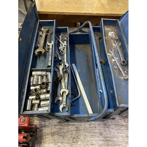 1209 - Three items, one red APS Auto Parts trolley jack, One black and yellow Stanley tool box and one blue... 