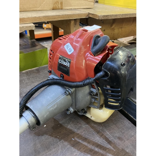 1213 - A black and red Cobra LRH26C long reach petrol hedge trimmer with 25