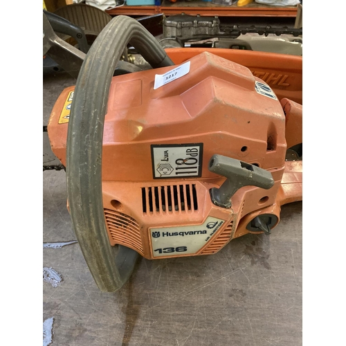 1217 - An orange Husqvarna 136 petrol chainsaw with 14