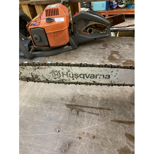 1217 - An orange Husqvarna 136 petrol chainsaw with 14