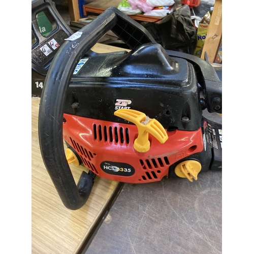 1219 - A black and red Homelite HCS3335 petrol chainsaw with 14