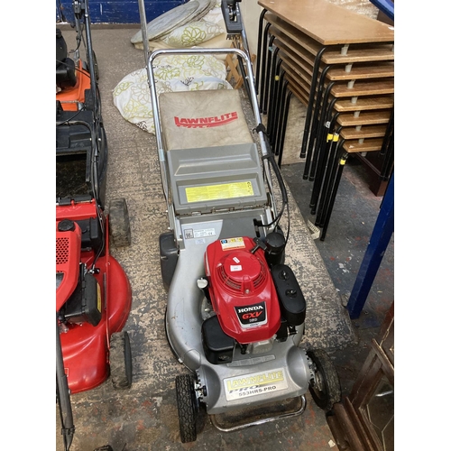 1223 - A red and grey Lawnflite Pro 553HRS petrol lawnmower with Honda GXV160 engine and grass collector