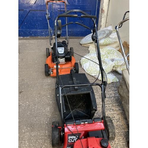 1224 - A black and red Rover Pro Cut 950 petrol lawnmower with grass collector