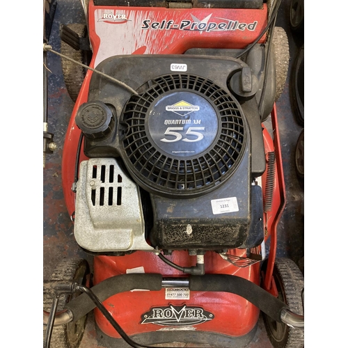 1231 - A black and red Rover self propelled petrol lawn mower with Briggs & Stratton Quantum XM55 engine an... 