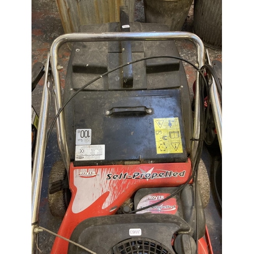 1231 - A black and red Rover self propelled petrol lawn mower with Briggs & Stratton Quantum XM55 engine an... 