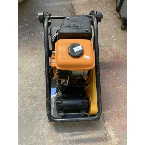 1244 - A black and orange Evolution Hulk petrol compacter plate