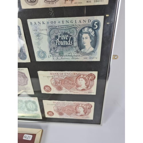 125 - Two frames containing a selection of vintage Bank of England notes