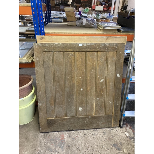 1250 - Two wooden barn doors, one approx. 42