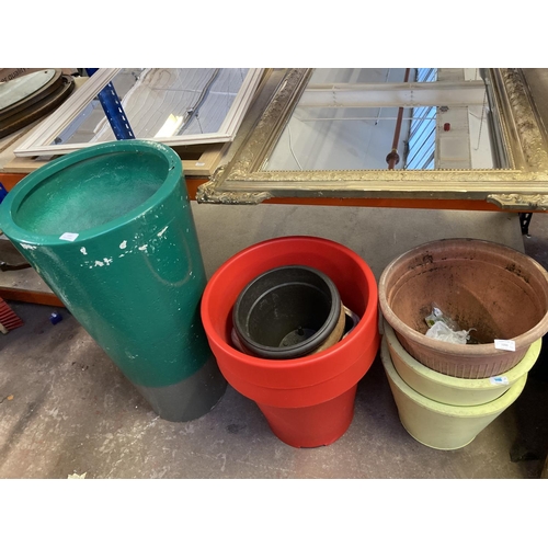 1251 - Ten garden planters to include galvanised, fibreglass and plastic