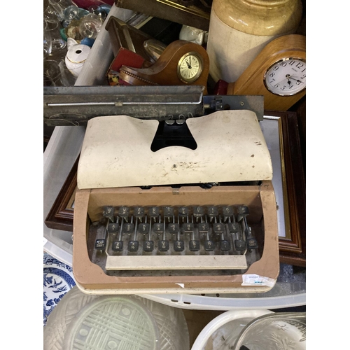 1268 - Six boxes containing salt glazed jar, glass decanter, wooden mantle clocks, vintage typewriter, glas... 