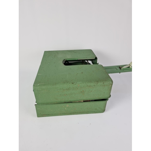 131 - A cased vintage green Elna Supermatic electric sewing machine