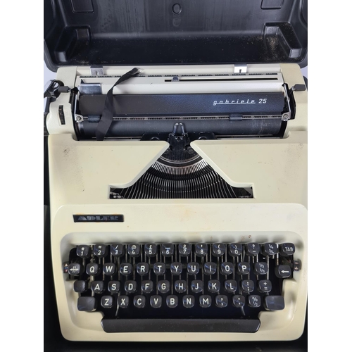 132 - A cased vintage Adler Gabriele 25 typewriter