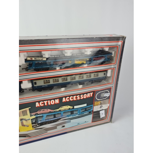 149 - A boxed vintage Lima OO gauge train and action accessory set