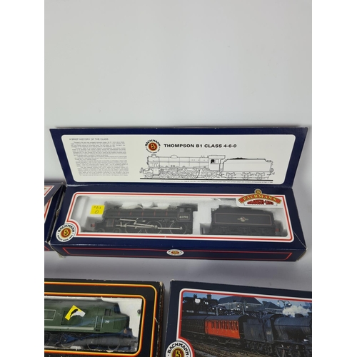 155 - Nine various model vehicles to include Bachmann Ivatt 2-6-2 B.R. lined black tank, Bachmann J39 6496... 