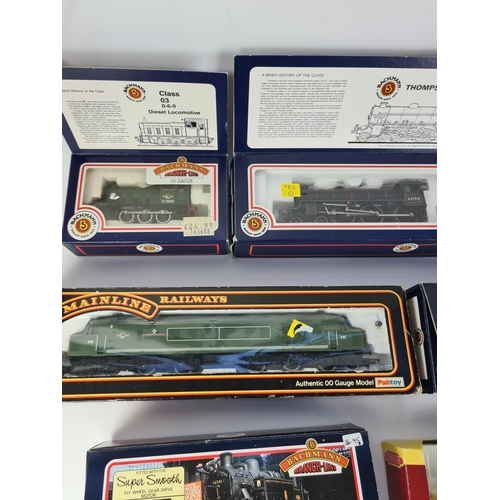 155 - Nine various model vehicles to include Bachmann Ivatt 2-6-2 B.R. lined black tank, Bachmann J39 6496... 