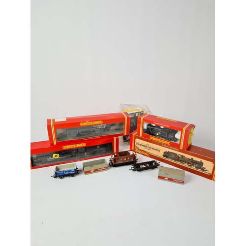 157 - A collection of model railway to include Hornby R239 BR 2-6-4 locomotive, Hornby R322 BR 2-8-0 locom... 