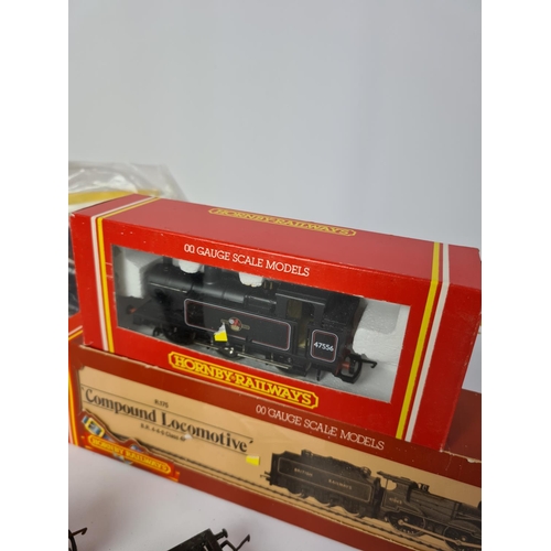 157 - A collection of model railway to include Hornby R239 BR 2-6-4 locomotive, Hornby R322 BR 2-8-0 locom... 