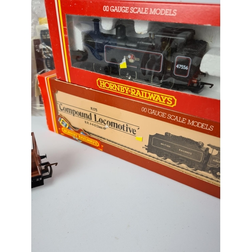 157 - A collection of model railway to include Hornby R239 BR 2-6-4 locomotive, Hornby R322 BR 2-8-0 locom... 