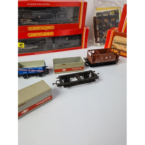 157 - A collection of model railway to include Hornby R239 BR 2-6-4 locomotive, Hornby R322 BR 2-8-0 locom... 