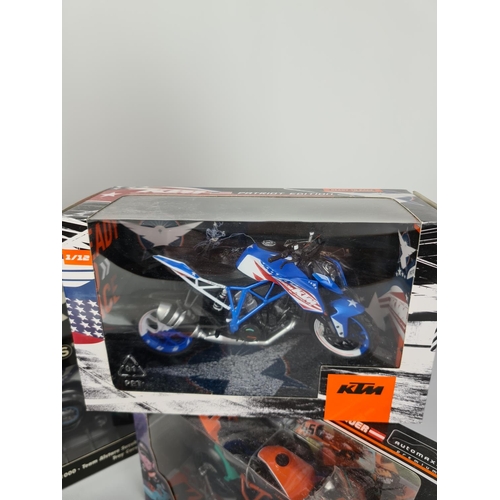 168 - Six boxed model motorcycles