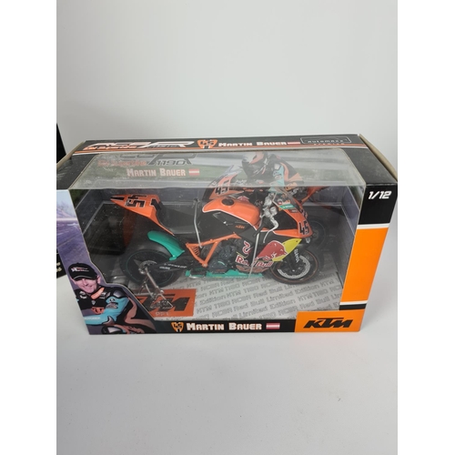 168 - Six boxed model motorcycles