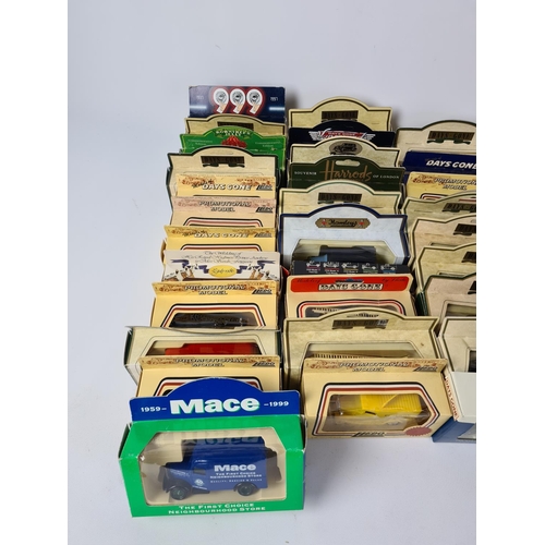 175 - A large quantity of boxed Lledo model vehicles