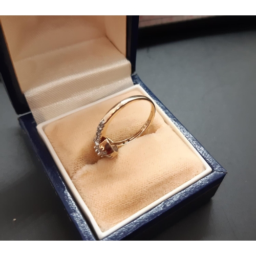 18 - A hallmarked 9ct yellow gold ladies teardrop ring with inset diamonds - size J ½ and approx. 1.95 gr... 